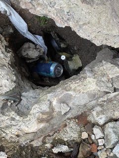 Excavated void beside a drain and foundation